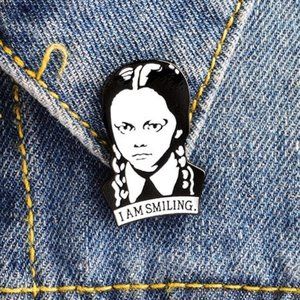 Wednesday Addams "I am smiling." enamel pin